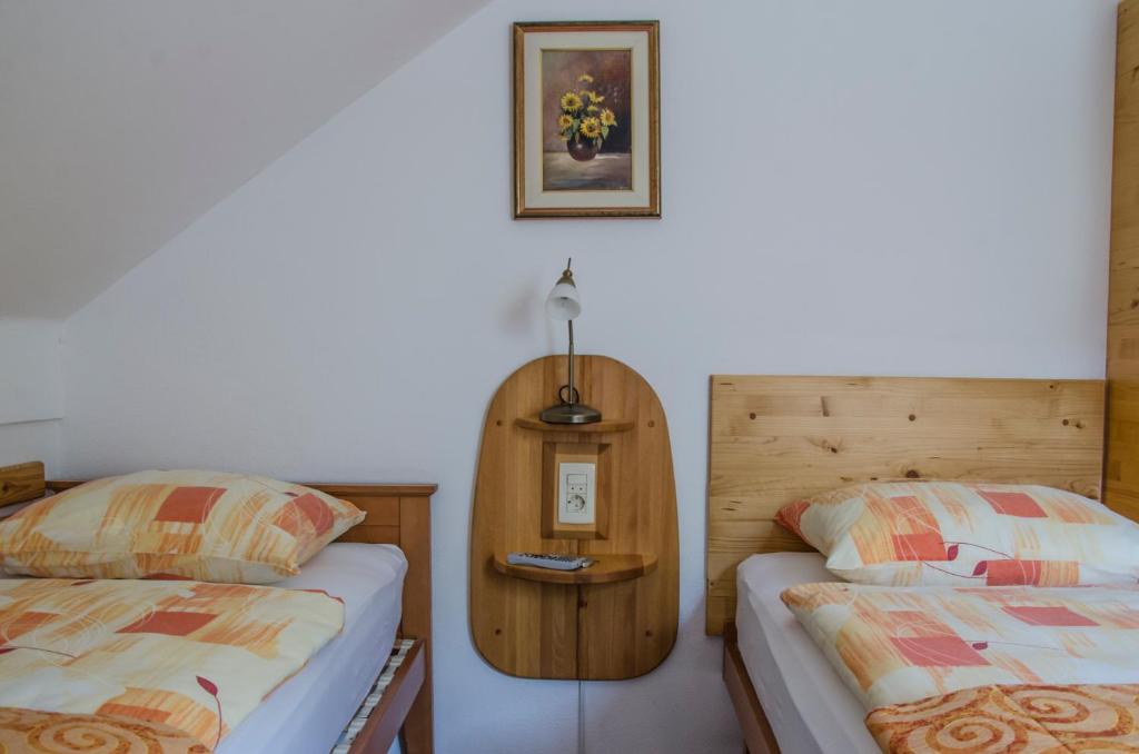 Postel nebo postele na pokoji v ubytování Miškar Rooms