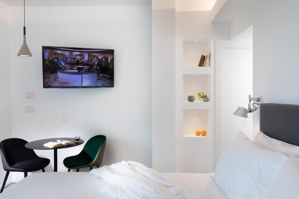 A television and/or entertainment centre at The View Luxury Apartments Taormina