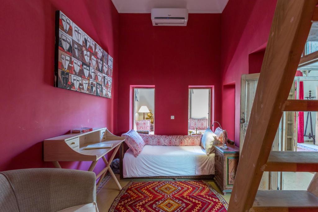Postel nebo postele na pokoji v ubytování Riad Azoulay