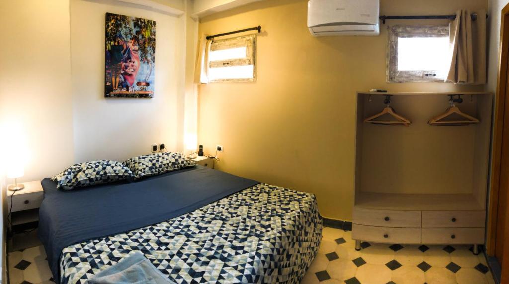 Postel nebo postele na pokoji v ubytování Casa Ebano 967