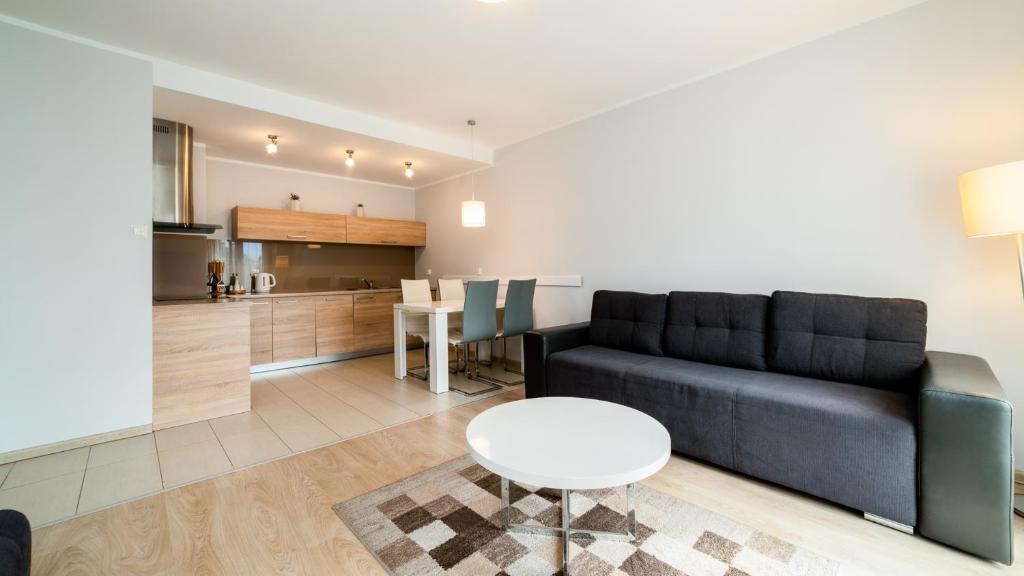 Kuchyňa alebo kuchynka v ubytovaní Apartamenty Sun & Snow Resort Sudety