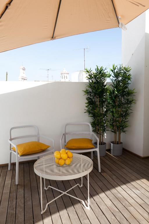 Balkón nebo terasa v ubytování GoToSeville GERONA SUITES