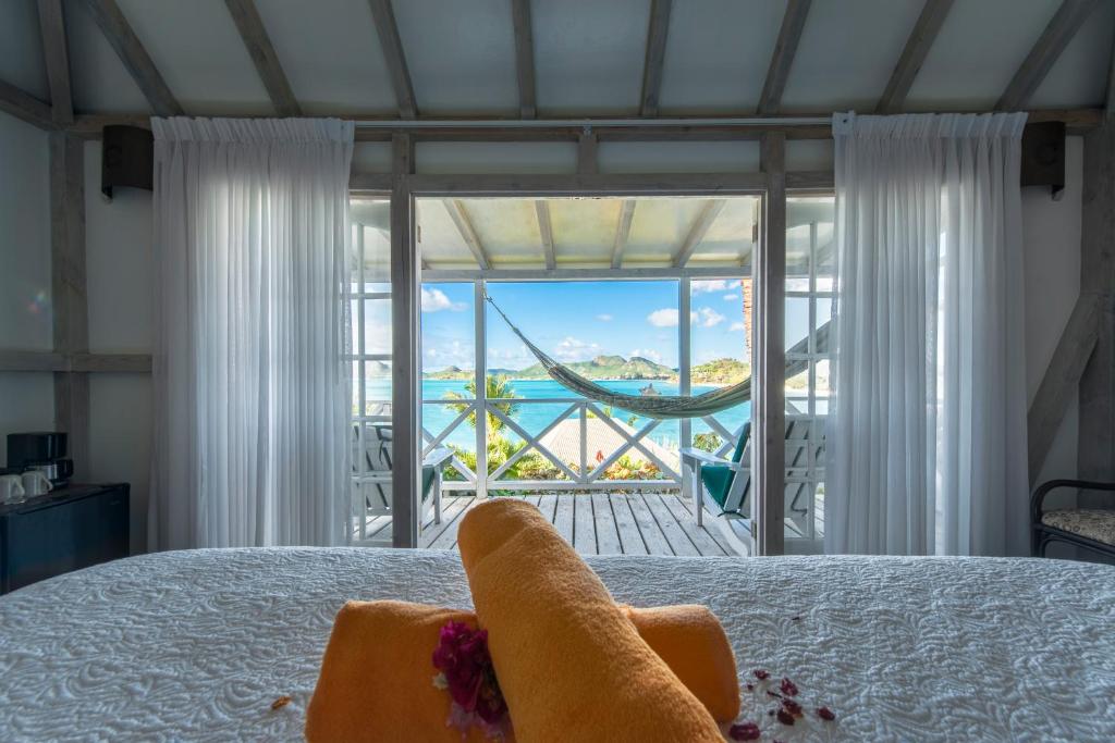 Postel nebo postele na pokoji v ubytování Cocobay Resort Antigua - All Inclusive - Adults Only