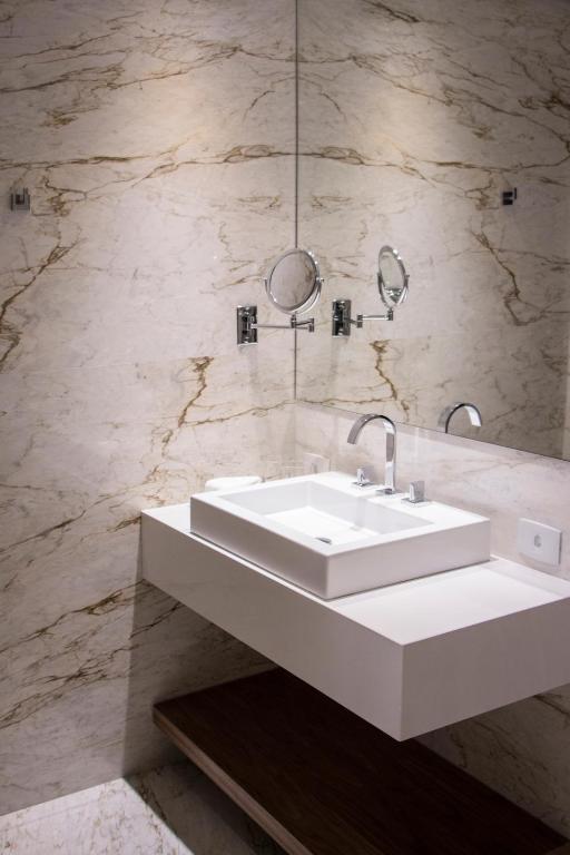 Koupelna v ubytování Nomaa Hotel