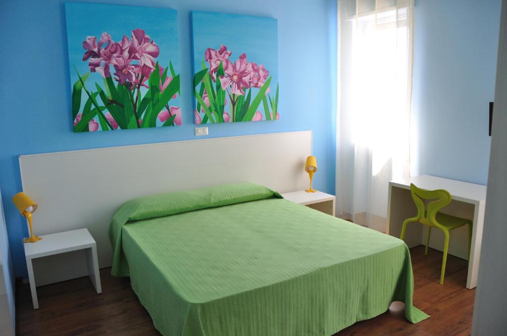 Postel nebo postele na pokoji v ubytování I Tre Fiori