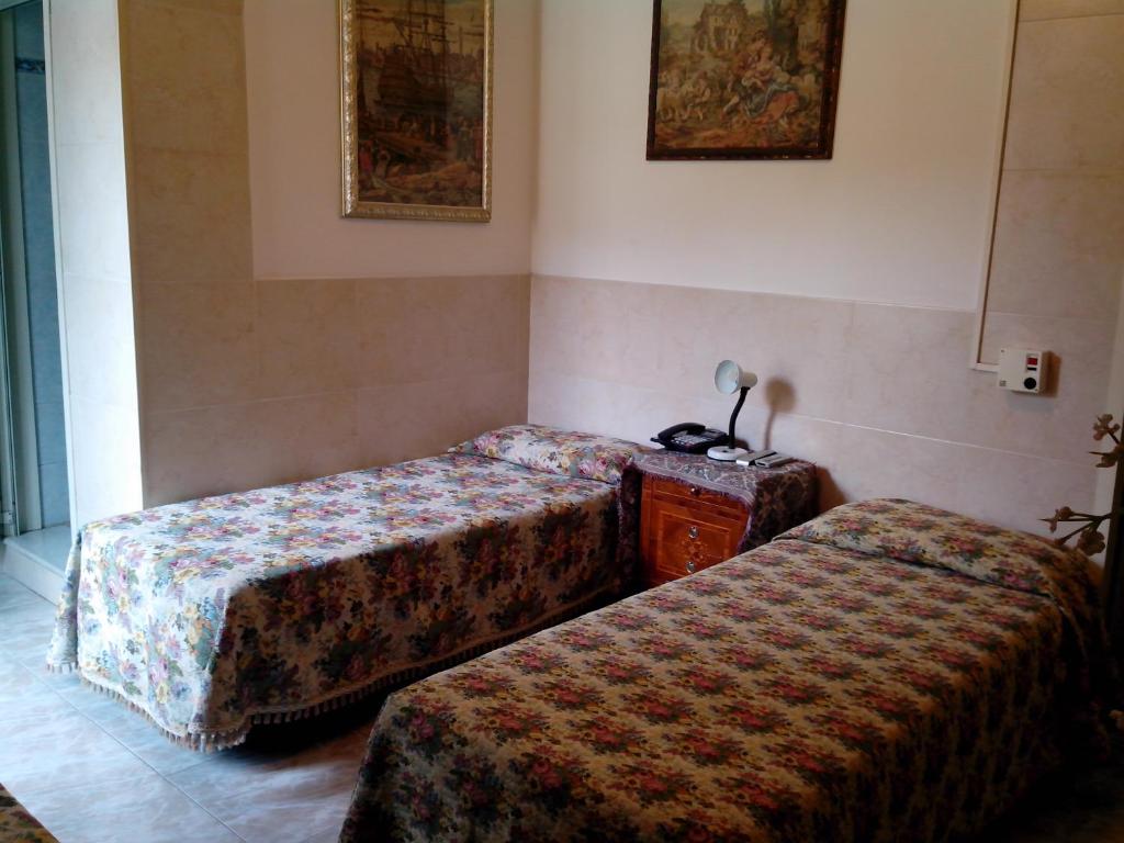 Postel nebo postele na pokoji v ubytování Hotel Stadler 2