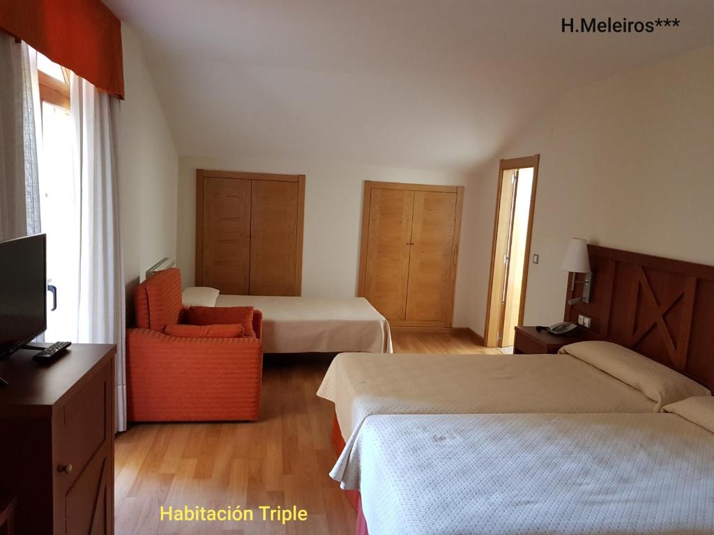 Postel nebo postele na pokoji v ubytování Hotel Meleiros