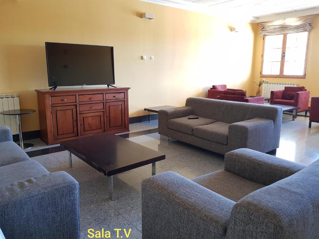 TV a/nebo společenská místnost v ubytování Hotel Meleiros