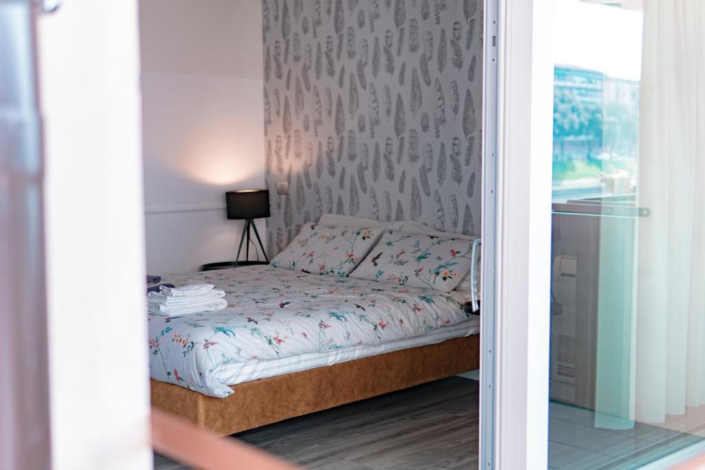 Postel nebo postele na pokoji v ubytování Alla Riva