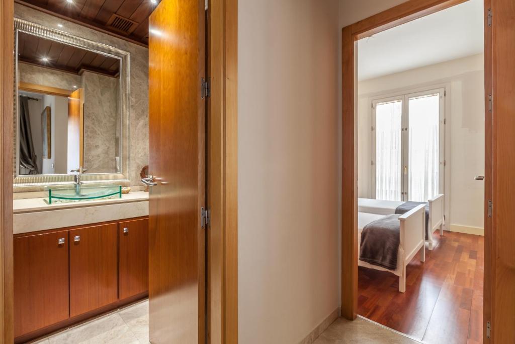 A bed or beds in a room at Atico de lujo en Aguilas