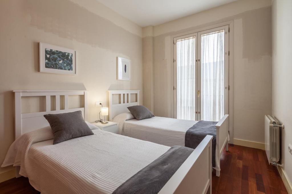 A bed or beds in a room at Atico de lujo en Aguilas