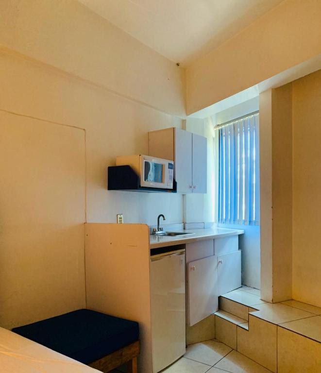 Kuchyň nebo kuchyňský kout v ubytování Hotel H Americas