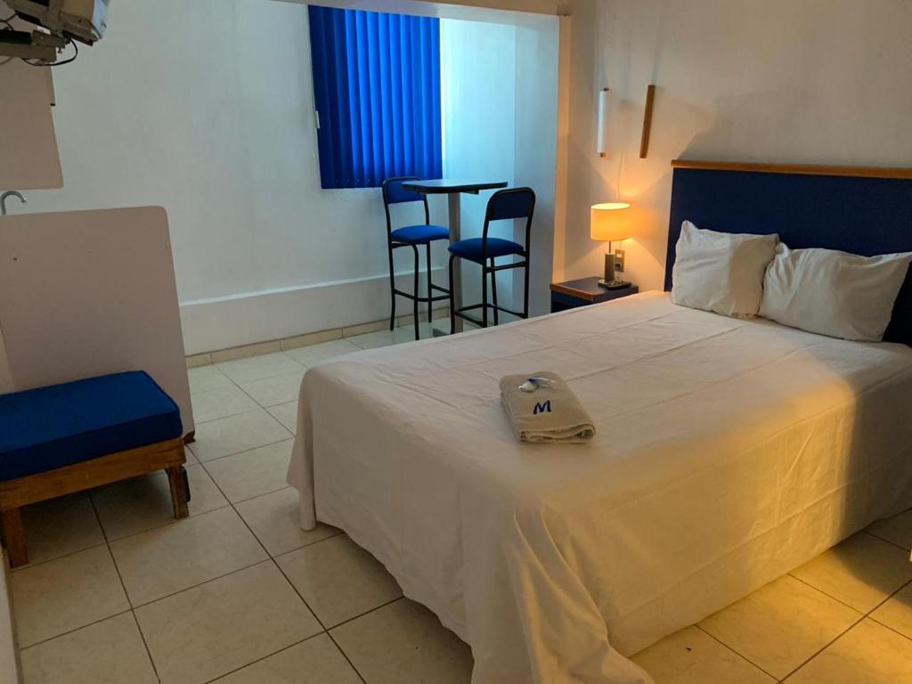 Postel nebo postele na pokoji v ubytování Hotel H Americas