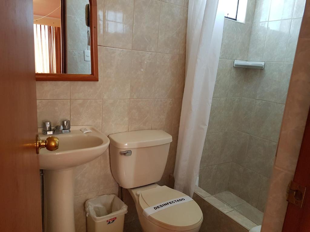 Koupelna v ubytování Copacabana Hotel