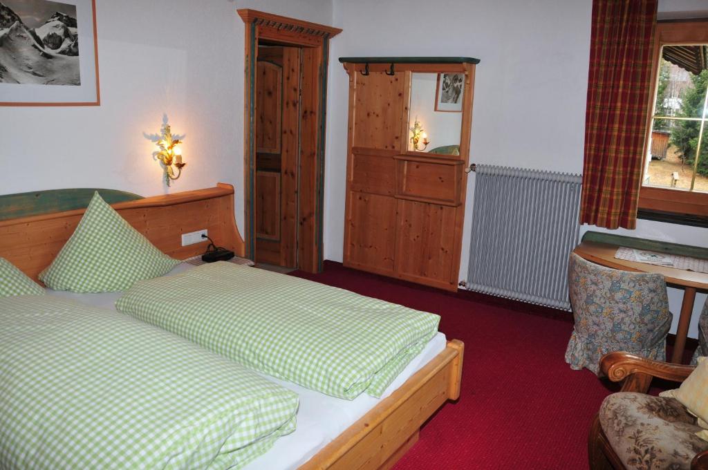 Postel nebo postele na pokoji v ubytování Pension Belvedere
