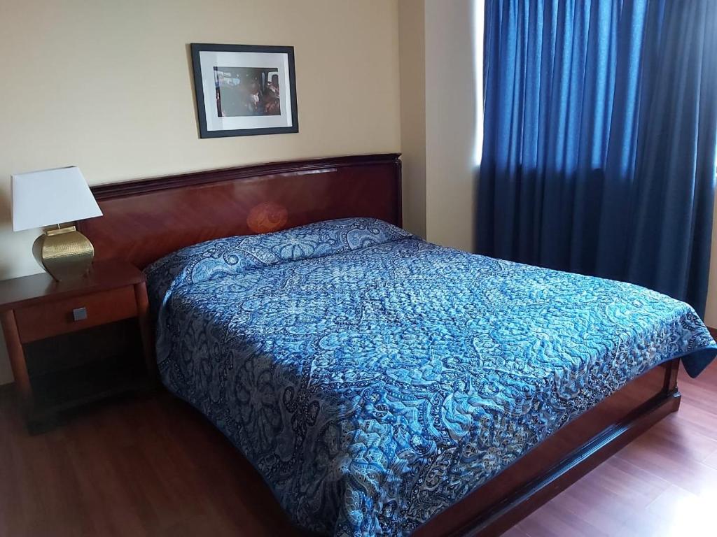 Postel nebo postele na pokoji v ubytování Hostal Tutamanda 2