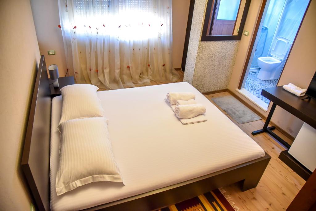 Postel nebo postele na pokoji v ubytování Hotel Sofra