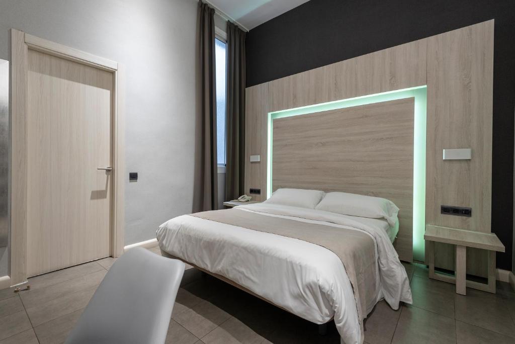 Postel nebo postele na pokoji v ubytování Plaza Goya Rooms