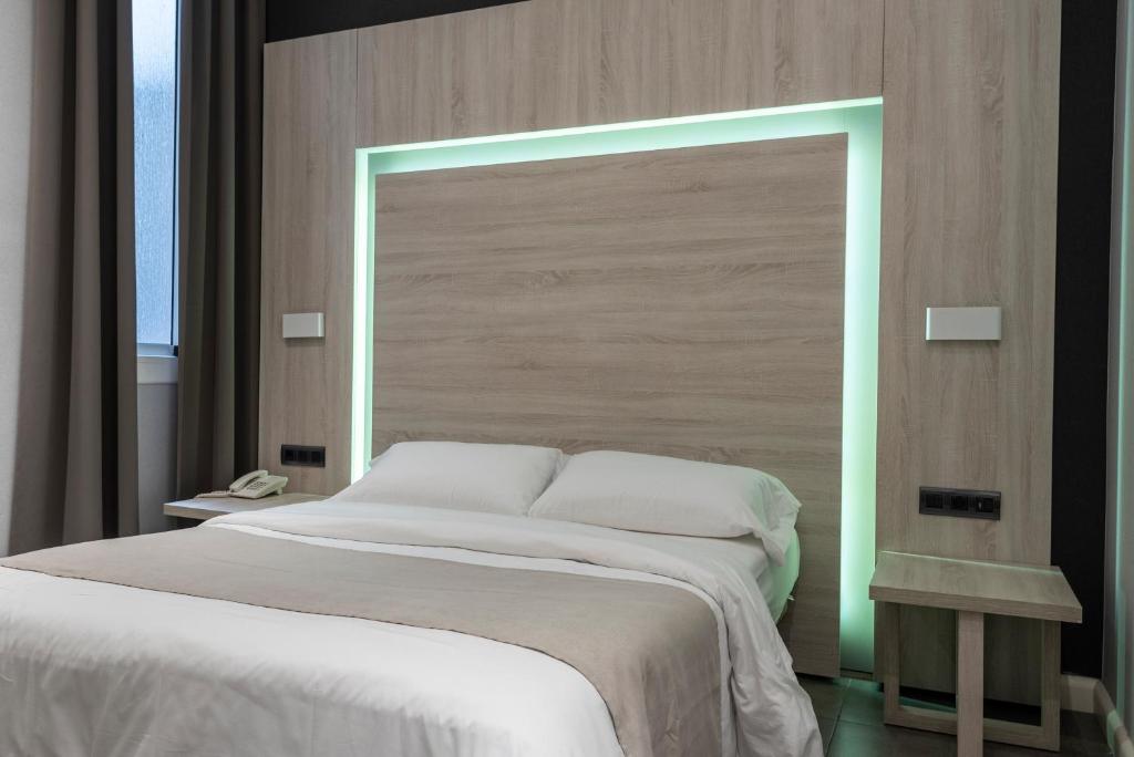 Postel nebo postele na pokoji v ubytování Plaza Goya Rooms