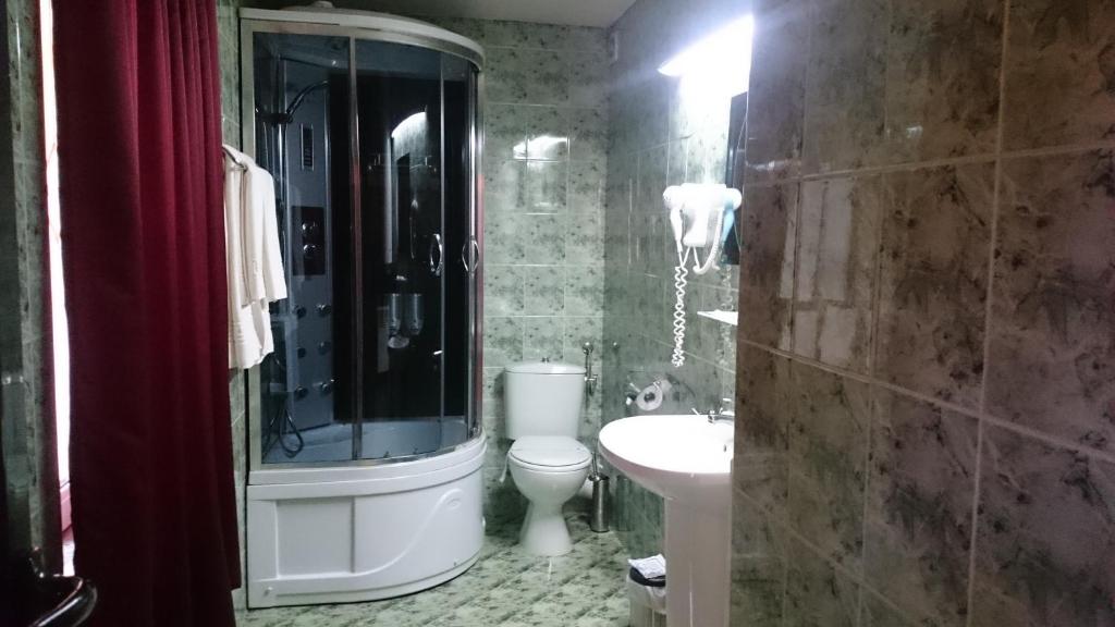 Koupelna v ubytování Rimini Club Inn & Suites
