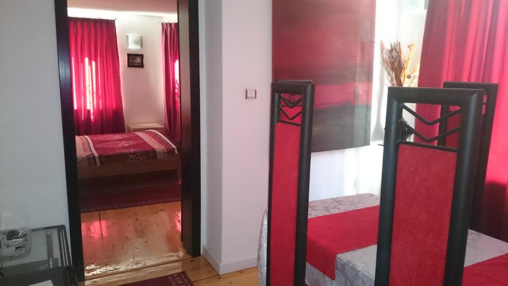 Postel nebo postele na pokoji v ubytování Rimini Club Inn & Suites