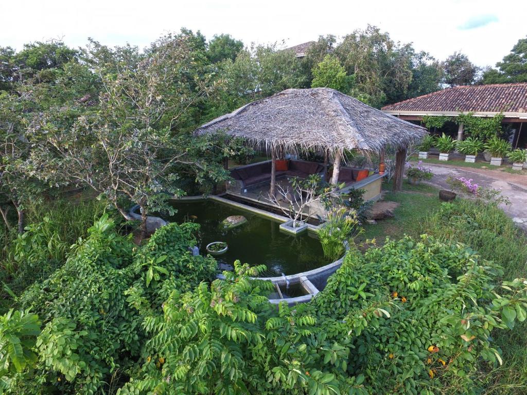 an aerial view of a house with a pond at The Horizon Hill Top Villa in Unawatuna