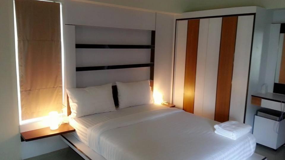 Postel nebo postele na pokoji v ubytování I Garden Place