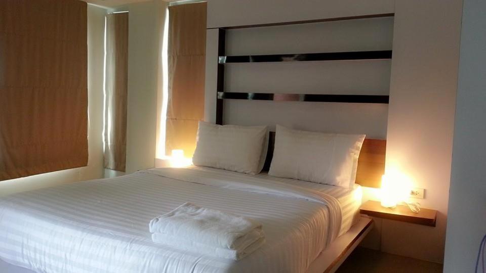 Postel nebo postele na pokoji v ubytování I Garden Place