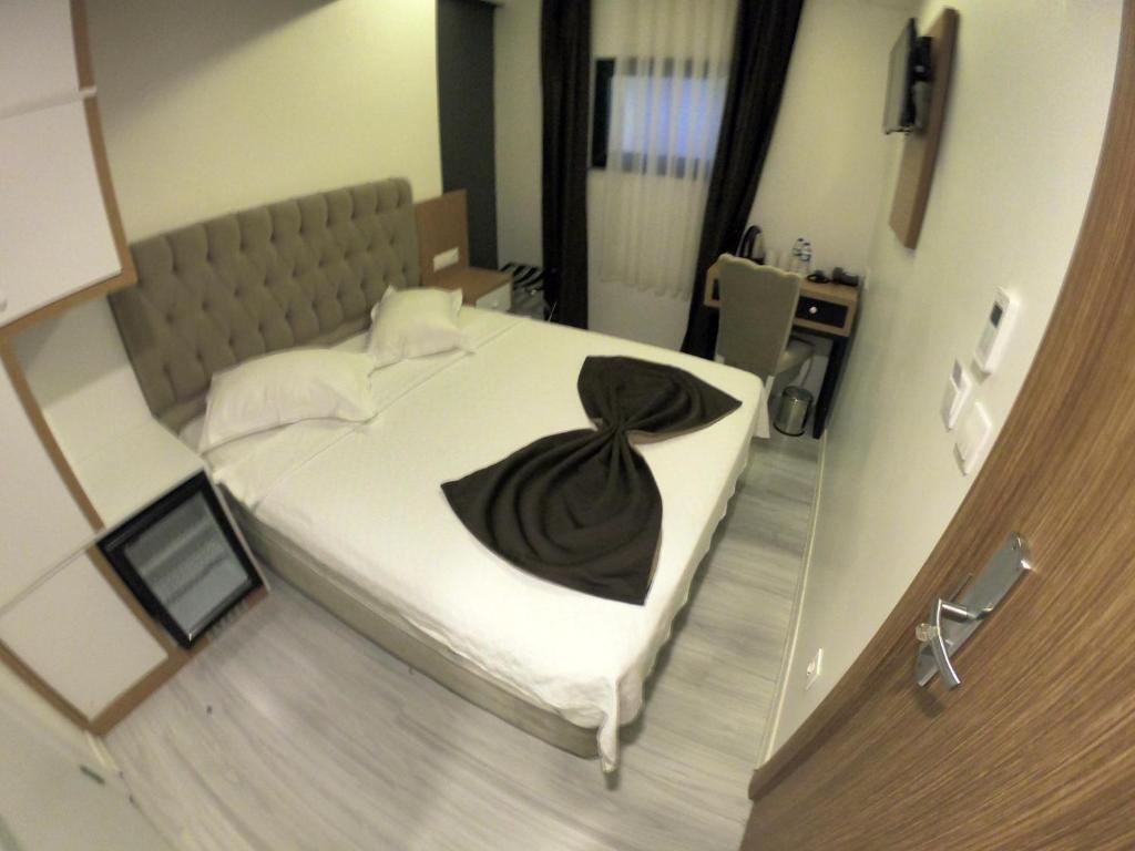 Postel nebo postele na pokoji v ubytování Tymbris Hotel Eskisehir