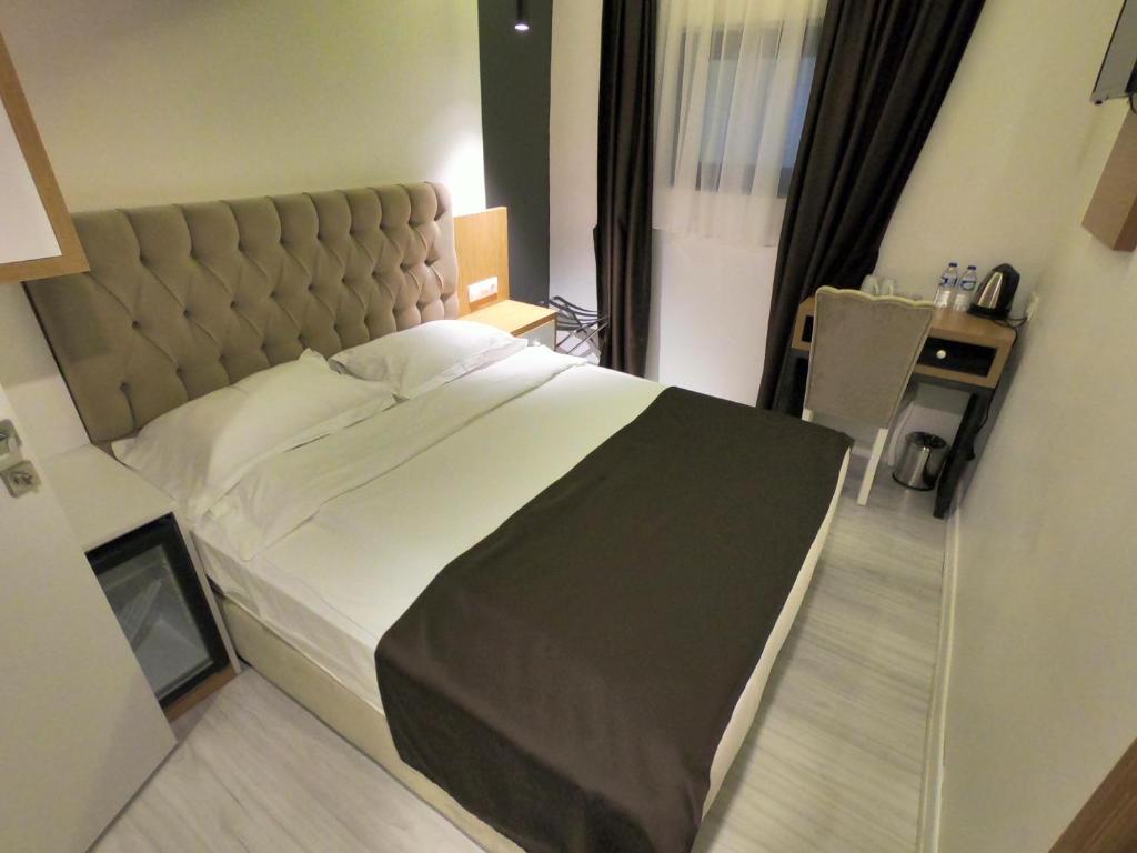 Postel nebo postele na pokoji v ubytování Tymbris Hotel Eskisehir