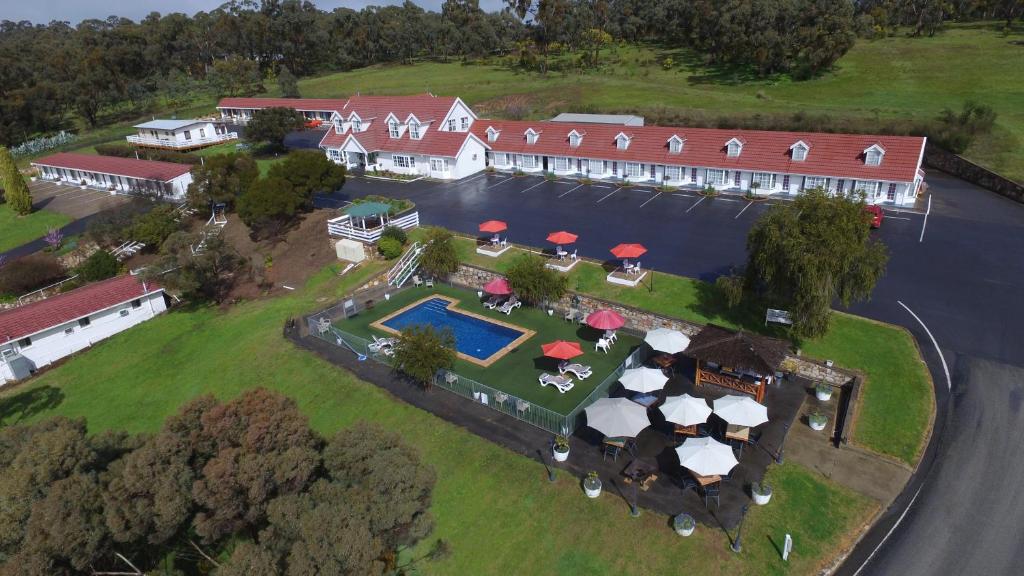 an aerial view of a house with a swimming pool at Clare Valley Motel in Clare
