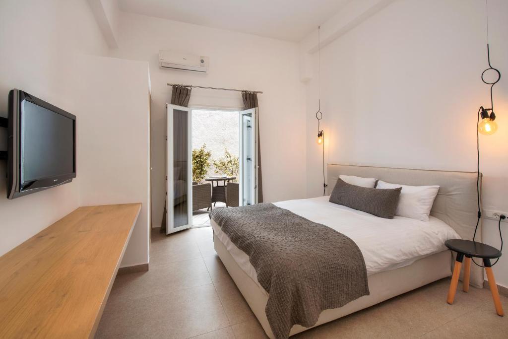 Łóżko lub łóżka w pokoju w obiekcie Hotel Eucalyptus