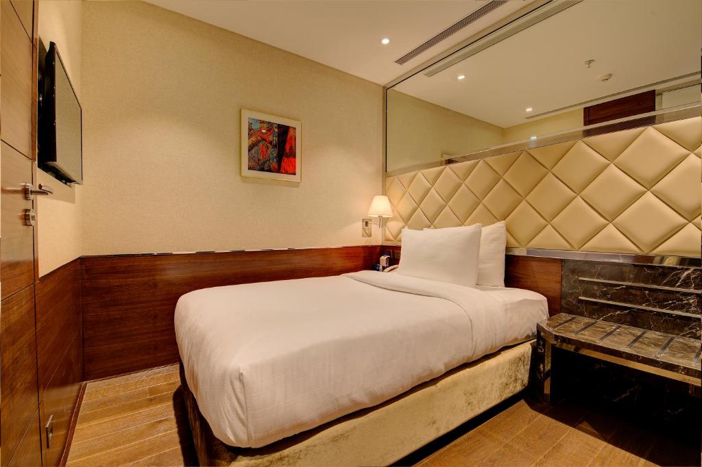 Uma cama ou camas num quarto em Niranta Transit Hotel Terminal 2 Arrivals/Landside