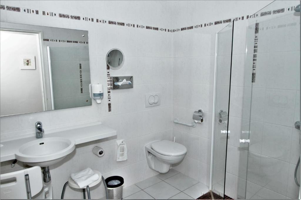 Koupelna v ubytování Hôtel Le Régent
