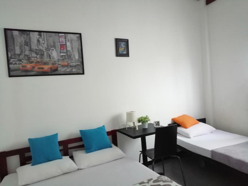 Postel nebo postele na pokoji v ubytování House of Seya