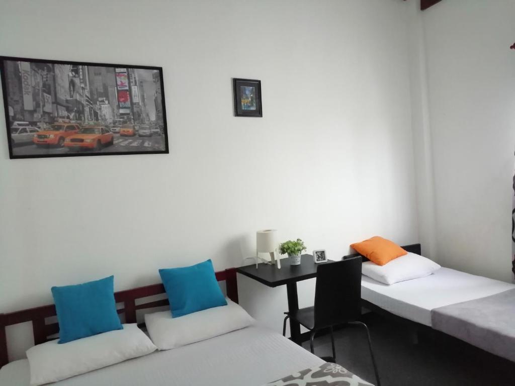 Postel nebo postele na pokoji v ubytování House of Seya