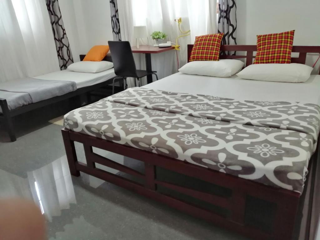 Postel nebo postele na pokoji v ubytování House of Seya