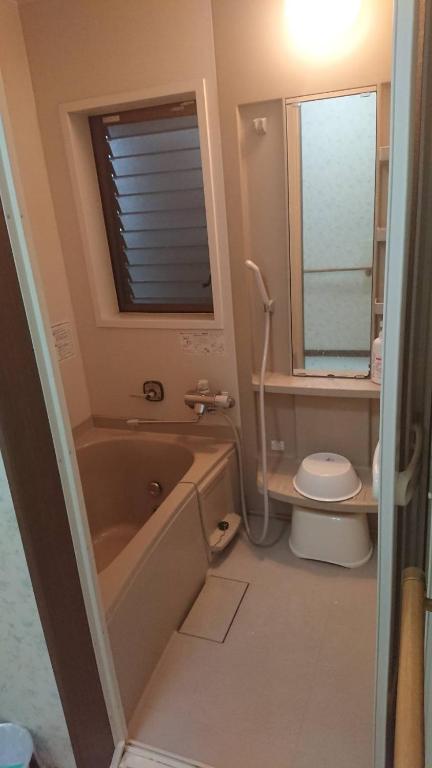 Koupelna v ubytování Guesthouse Yoshikawa