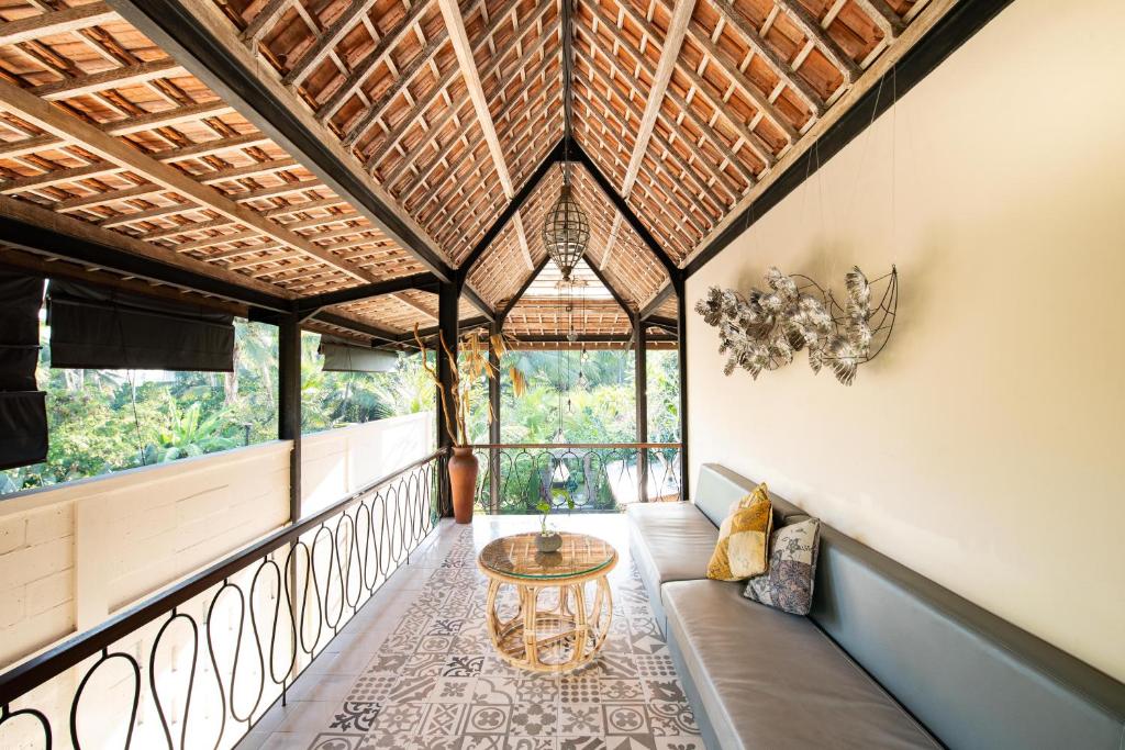 Posezení v ubytování Ubud Tropical