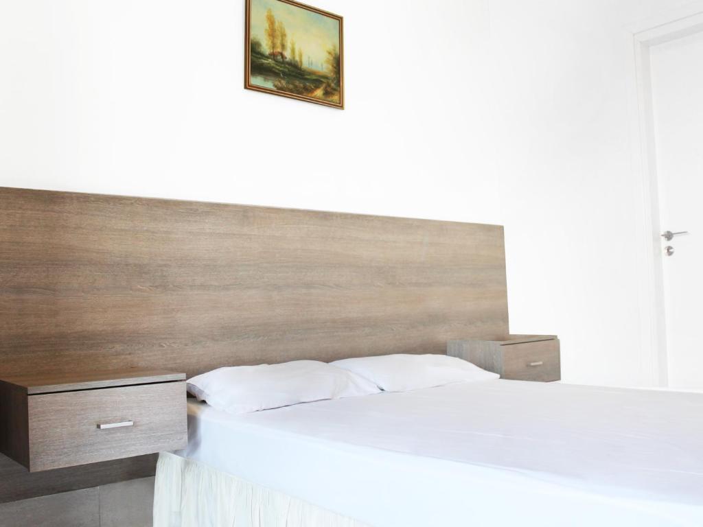 Postel nebo postele na pokoji v ubytování Rebioz Hotel