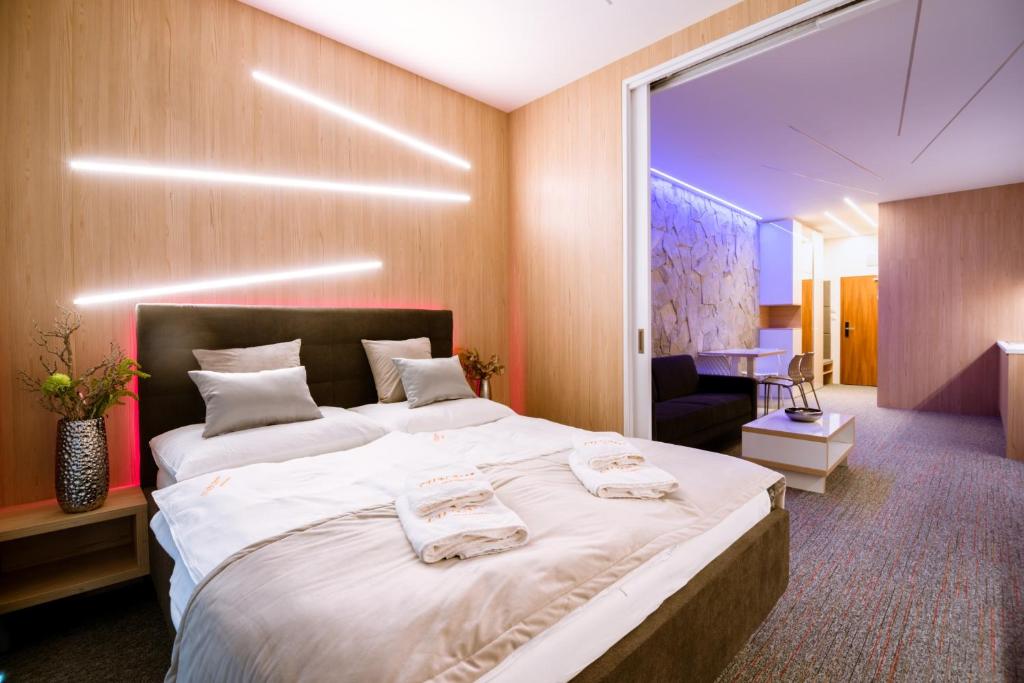 Posteľ alebo postele v izbe v ubytovaní Apartment Luna Hrebienok C108