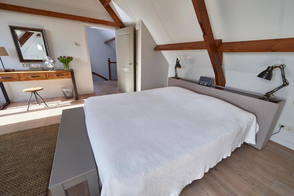 Postel nebo postele na pokoji v ubytování Villa Magnolia