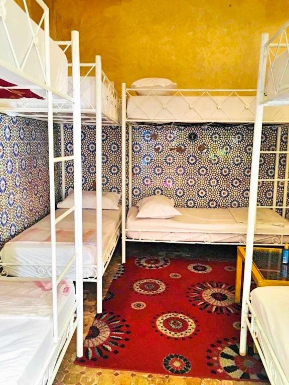 Postel nebo postele na pokoji v ubytování Riad Dia