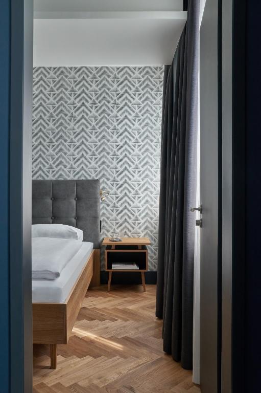 Postel nebo postele na pokoji v ubytování Hotel MIO by AMANO