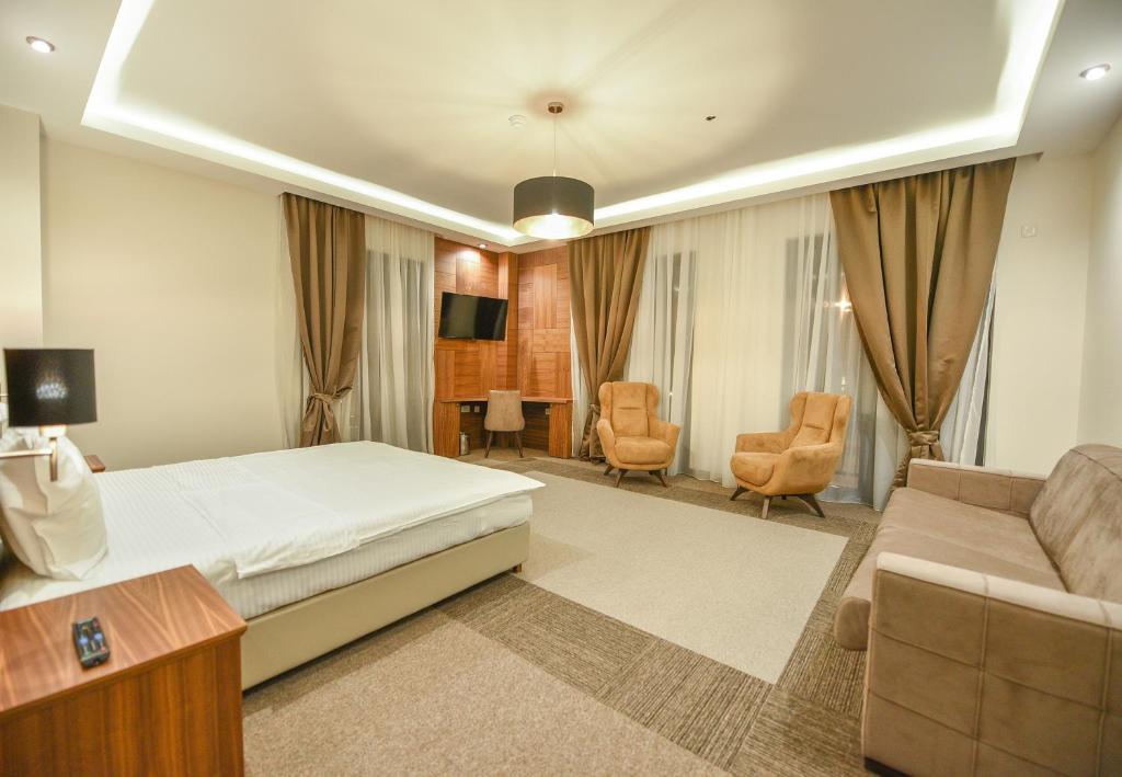 Llit o llits en una habitació de Hotel Lazaro