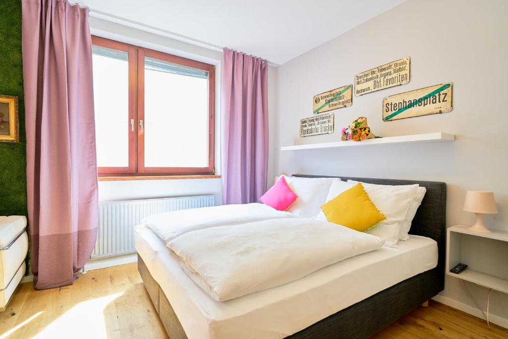 Postel nebo postele na pokoji v ubytování Leuhusen Center Apartments Vienna, Wien