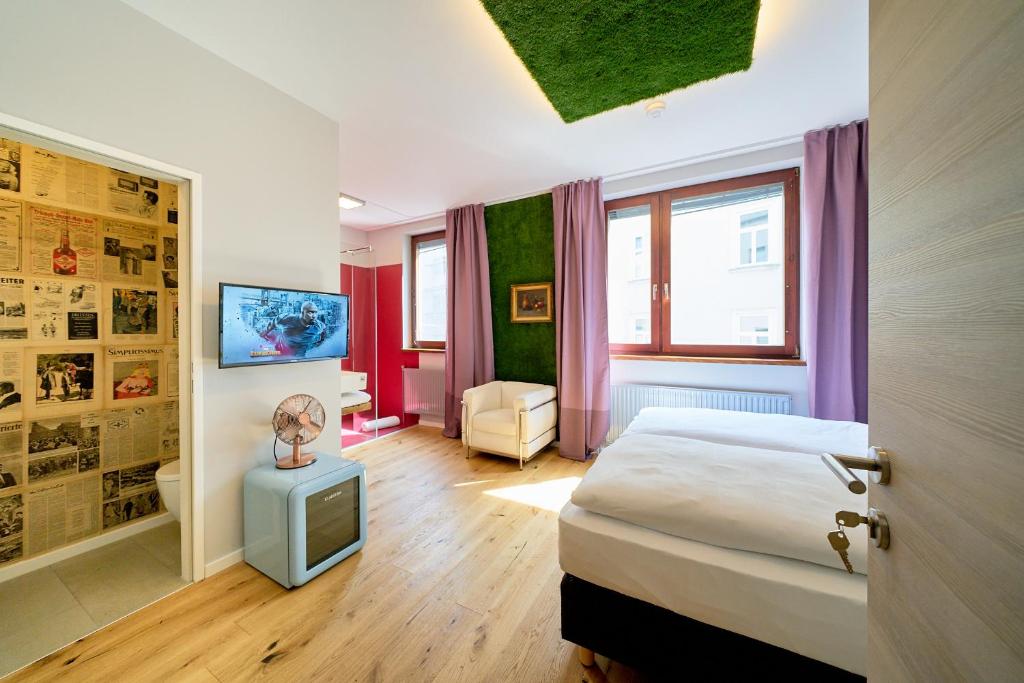 Postel nebo postele na pokoji v ubytování Leuhusen Center Apartments Vienna, Wien