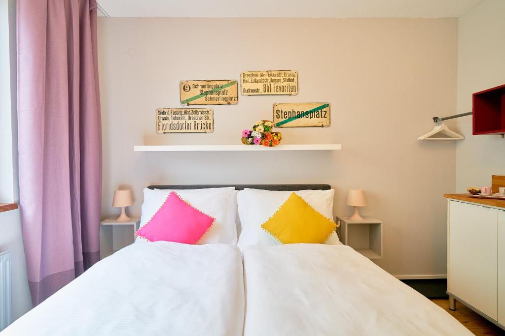 Postel nebo postele na pokoji v ubytování Leuhusen Center Apartments Vienna, Wien