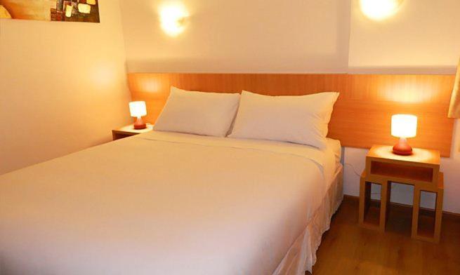 Cama o camas de una habitación en Hotel Romano