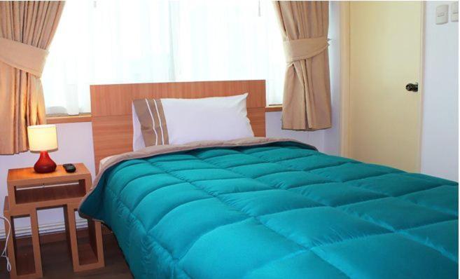 Cama o camas de una habitación en Hotel Romano